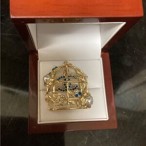 Chanel birdcage pendant.